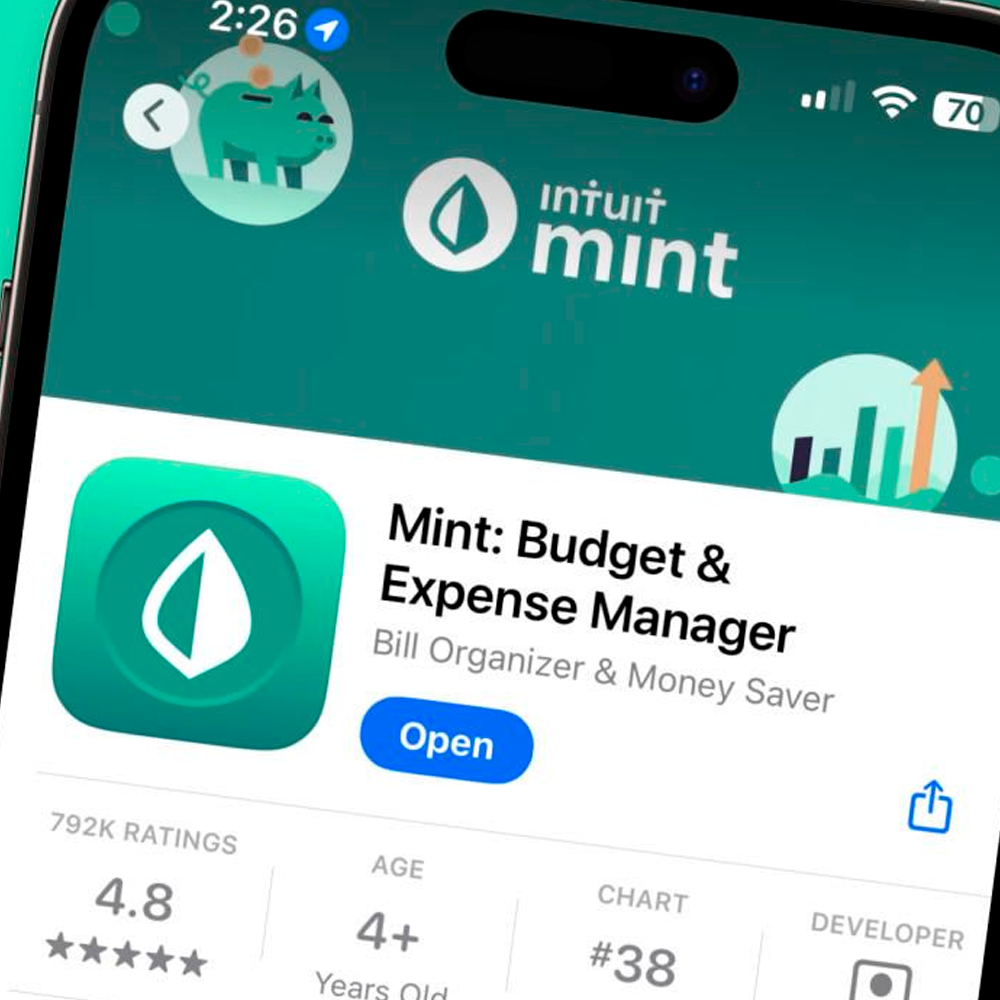 Close-up of a smartphone screen displaying the Mint: Budget & Expense Manager app page in the app store, showing the app icon, name, rating, age requirement, and an "Open" button.