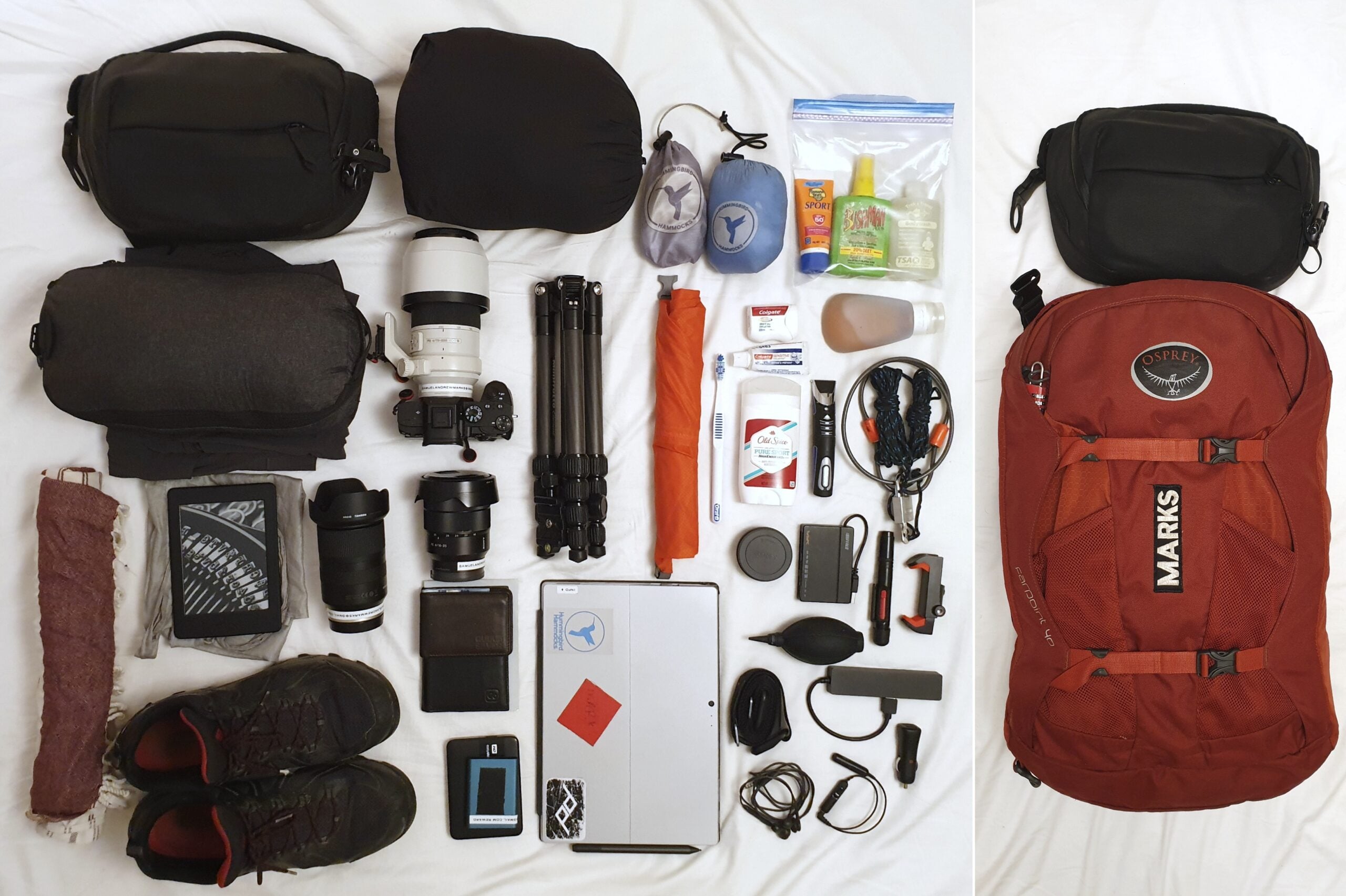 A neatly arranged collection of travel and camera gear next to a red Osprey backpack. Items include cameras, lenses, tripod, shoes, clothes, toiletries, tech accessories, a laptop, and various small essentials on a white background.