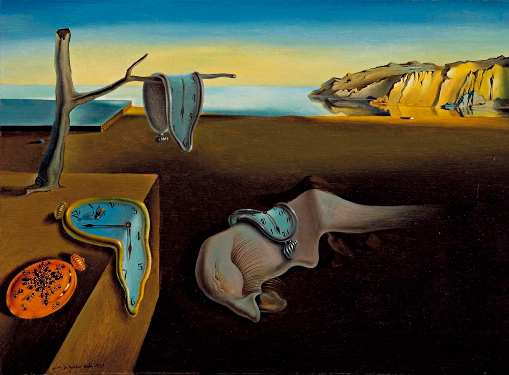 A surreal landscape showing melting clocks draped over a tree, a strange object, and a ledge, with cliffs and water in the background under a clear sky. The scene appears dreamlike and unusual.