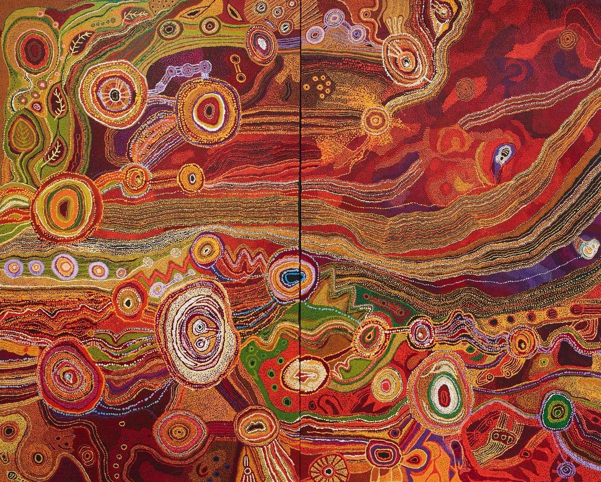 Colorful abstract painting with swirling patterns, dots, and concentric circles in vivid reds, oranges, yellows, greens, and purples, evoking a sense of movement and texture across the entire canvas.