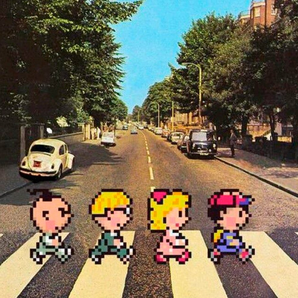Four pixelated video game characters walk across a crosswalk on a city street, mimicking the famous Abbey Road Beatles album cover, with trees, cars, and buildings in the background under a blue sky.