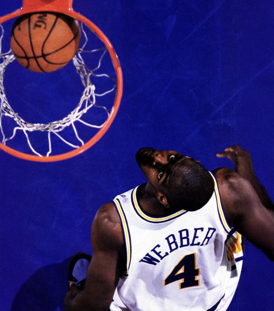 A basketball player wearing a white jersey with the name "Webber" and the number 4 looks up towards a basketball approaching the hoop, with the blue court visible below.