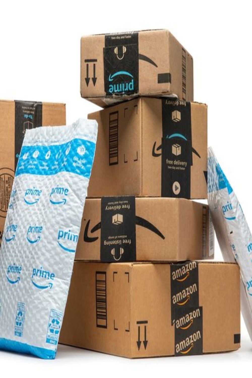 A stack of Amazon Prime delivery boxes and bubble mailers with blue and black Amazon Prime branding, arranged on a white background.