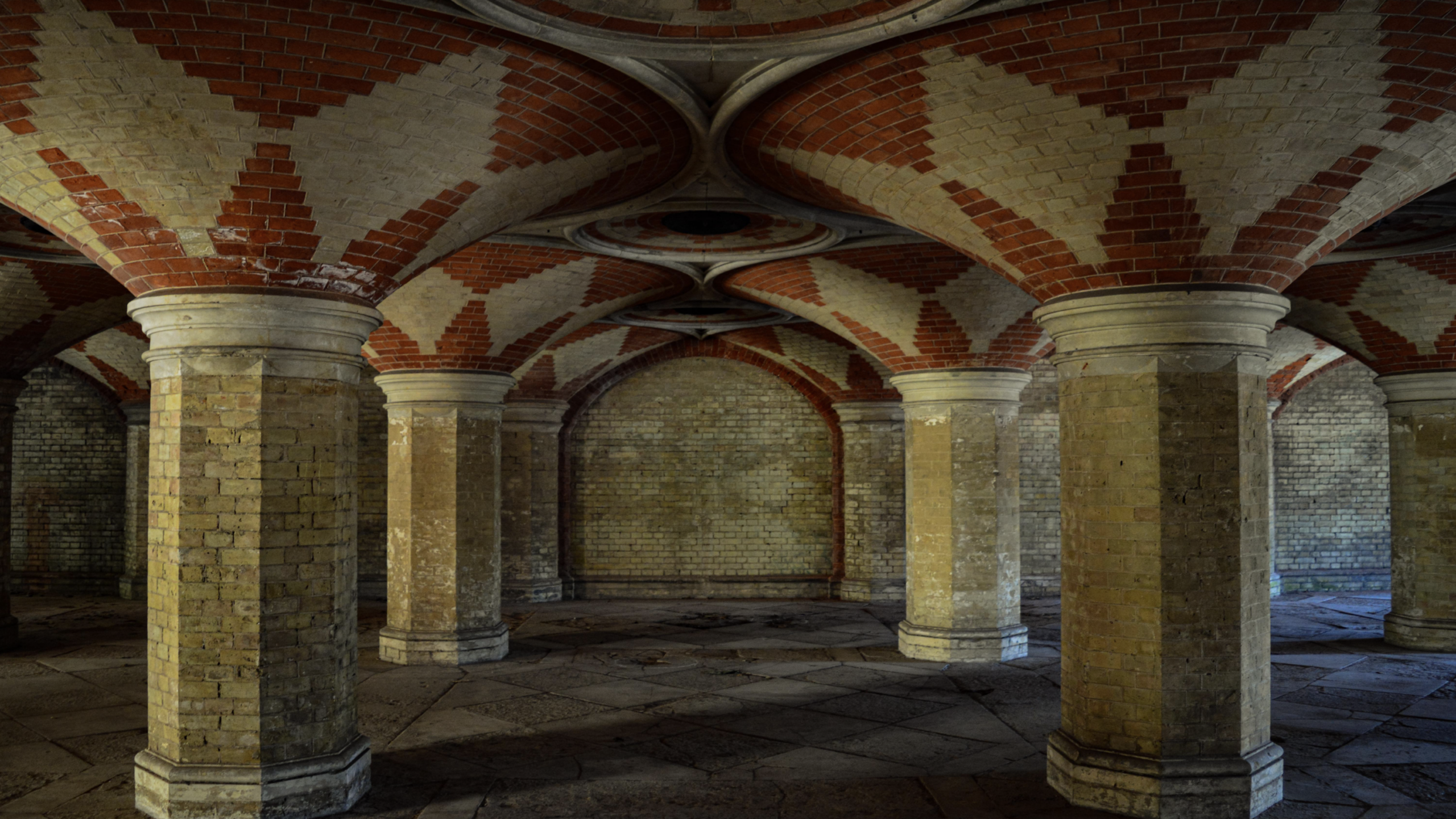 Abandoned Crystal Palace subway tunnel in London with brick arches