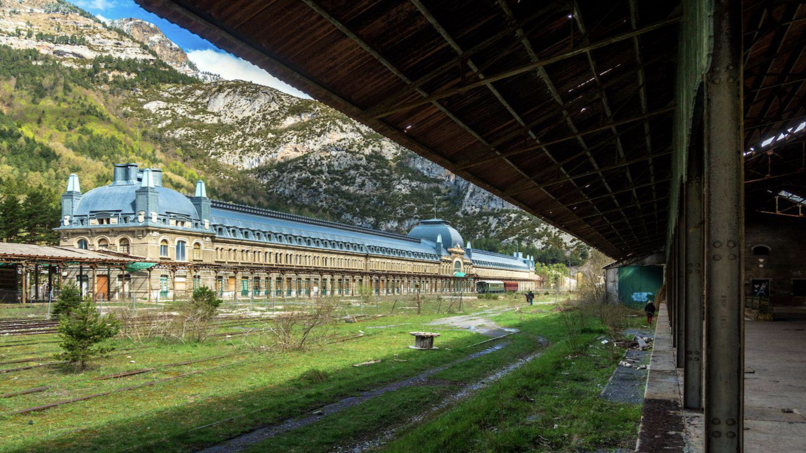 Abandoned Canfranc railway station in Spain with long platform and vintage design