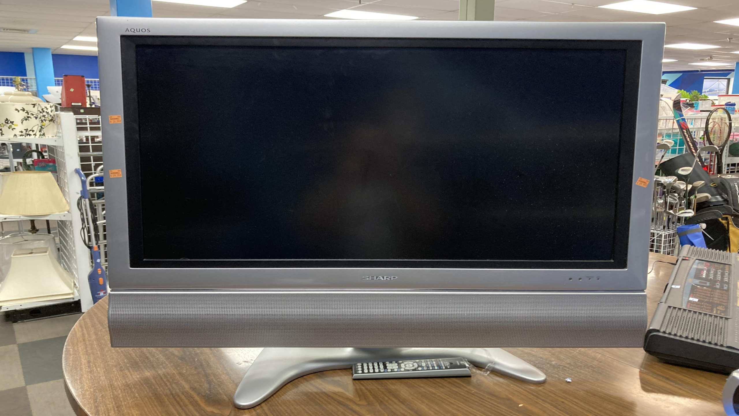 18 old expensive items like first generation flat screen TVs