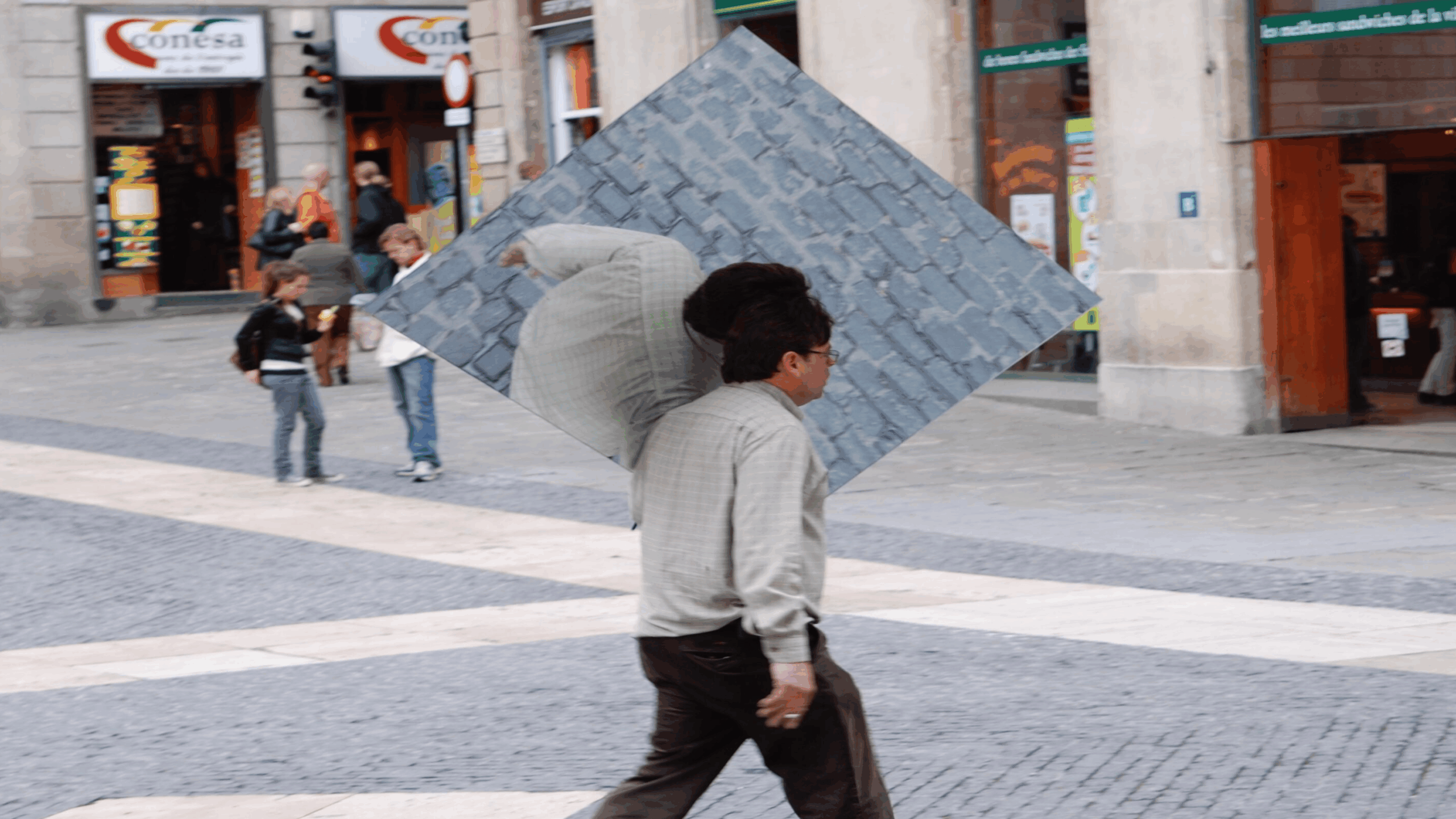 Man holding a mirrored image of himself during a glitch in reality