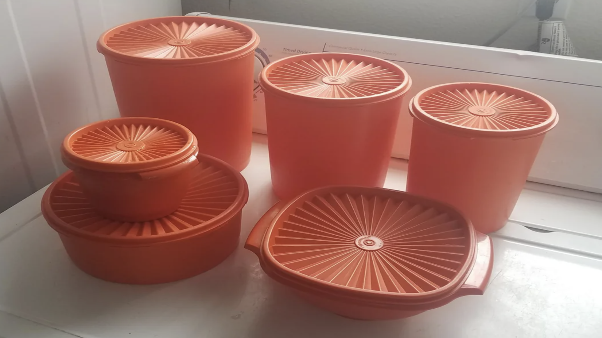 8 vintage Tupperware pieces including rare Millionaire Line containers