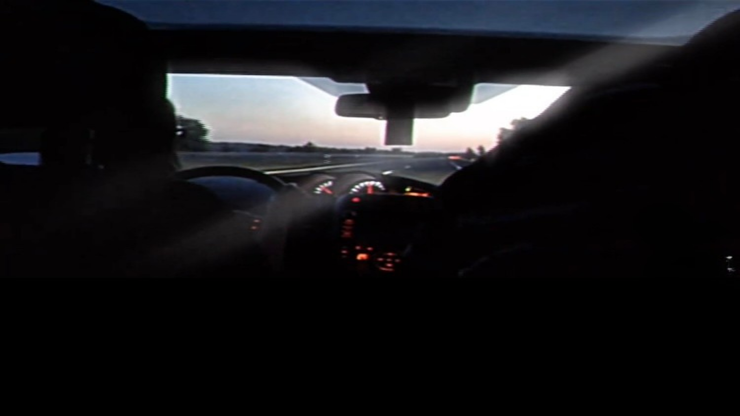 Images of a child half asleep in the backseat during an early morning drive