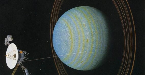 A spacecraft with a large dish antenna approaches a blue-green planet with faint rings, set against a black star-filled space background.