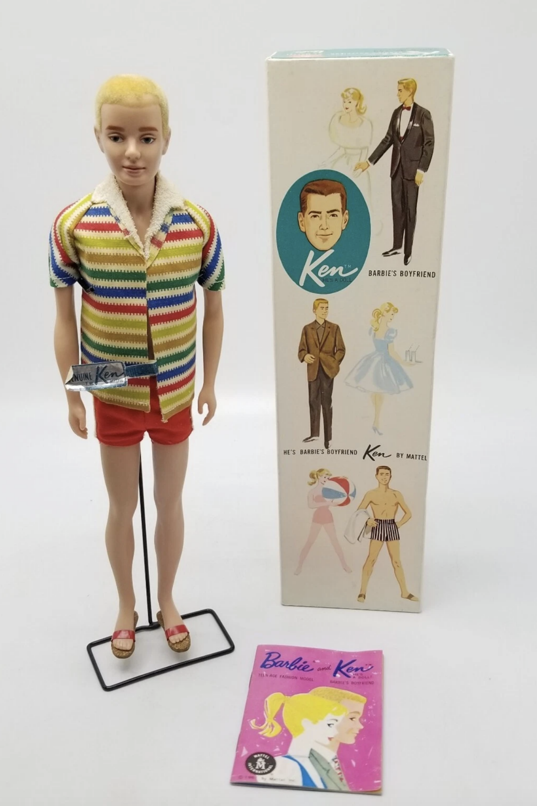 Rare blonde Ken dolls from 1961 displayed with classic swimsuit outfit