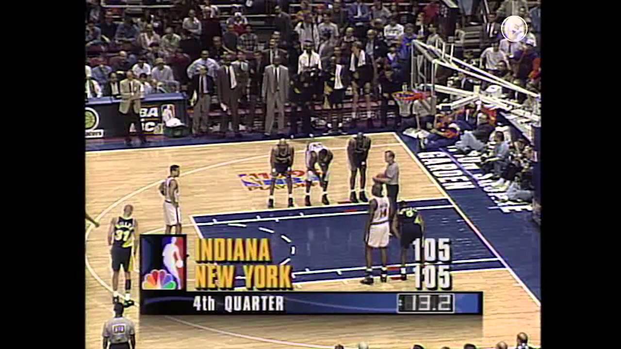 A basketball player from the New York Knicks prepares to shoot a free throw against the Indiana Pacers. The score is tied 105-105 with 13.2 seconds left in the fourth quarter, shown on an NBC broadcast.