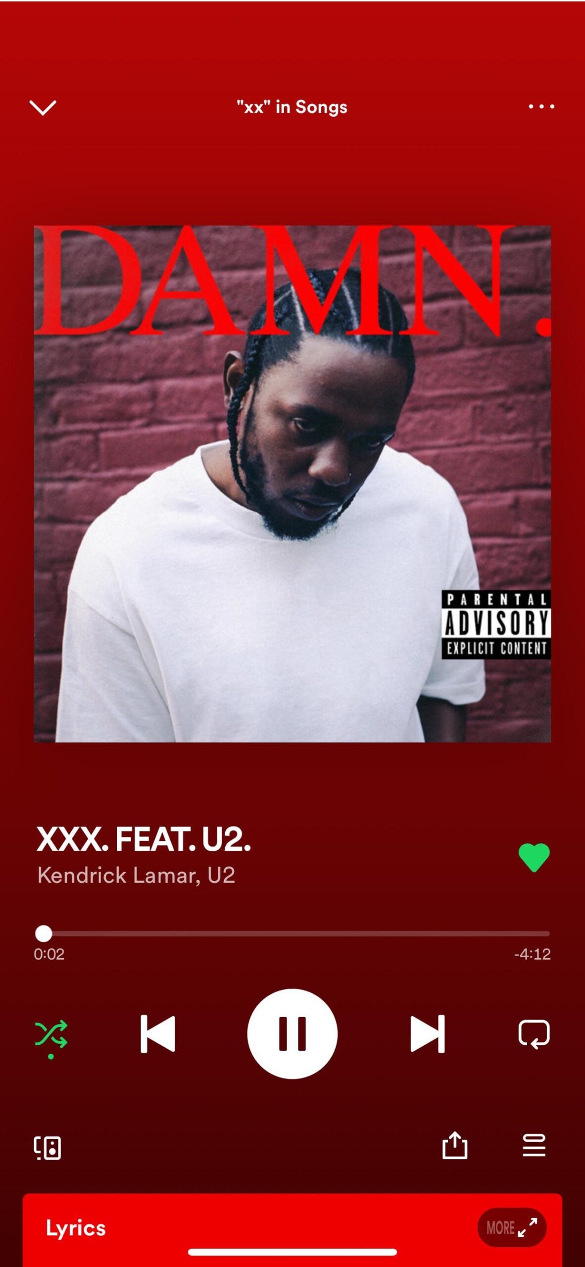 Screenshot of a music player showing Kendrick Lamar’s album "DAMN." The song "XXX. FEAT. U2." is playing. The album cover features Kendrick Lamar in a white shirt against a red brick wall.
