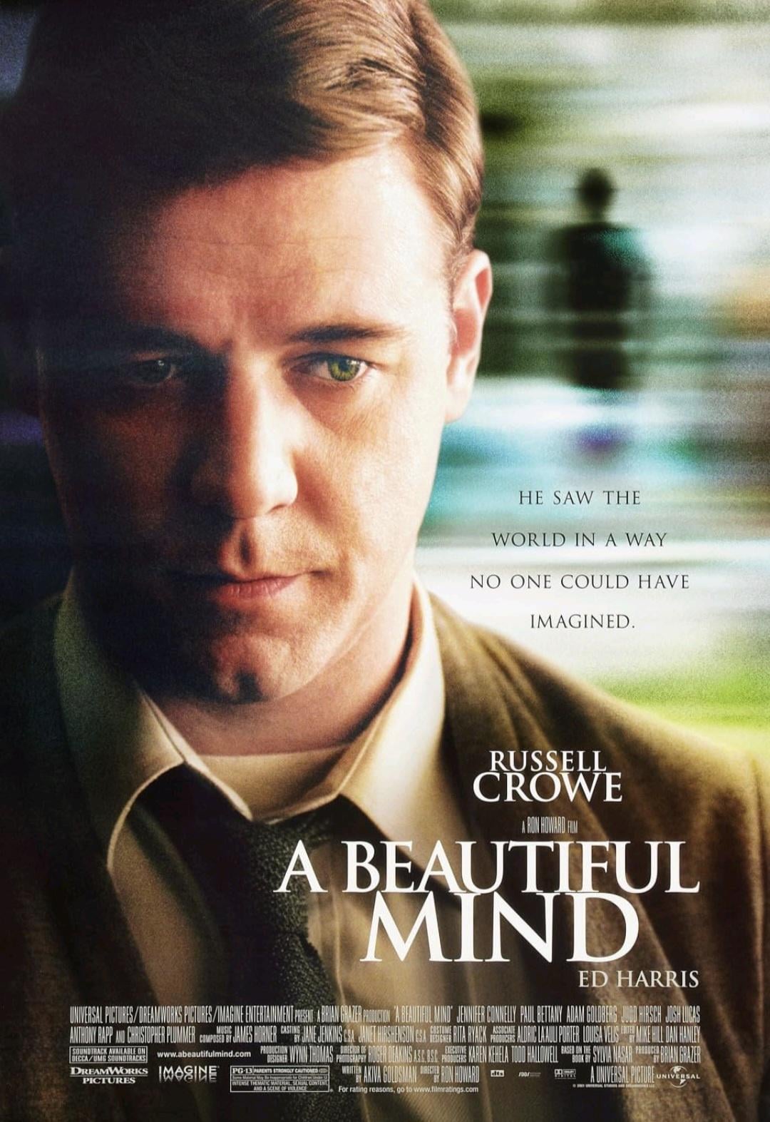 Movie poster for "A Beautiful Mind" featuring a close-up of a man in a suit with a serious expression, streaked background, and the tagline: "He saw the world in a way no one could have imagined.