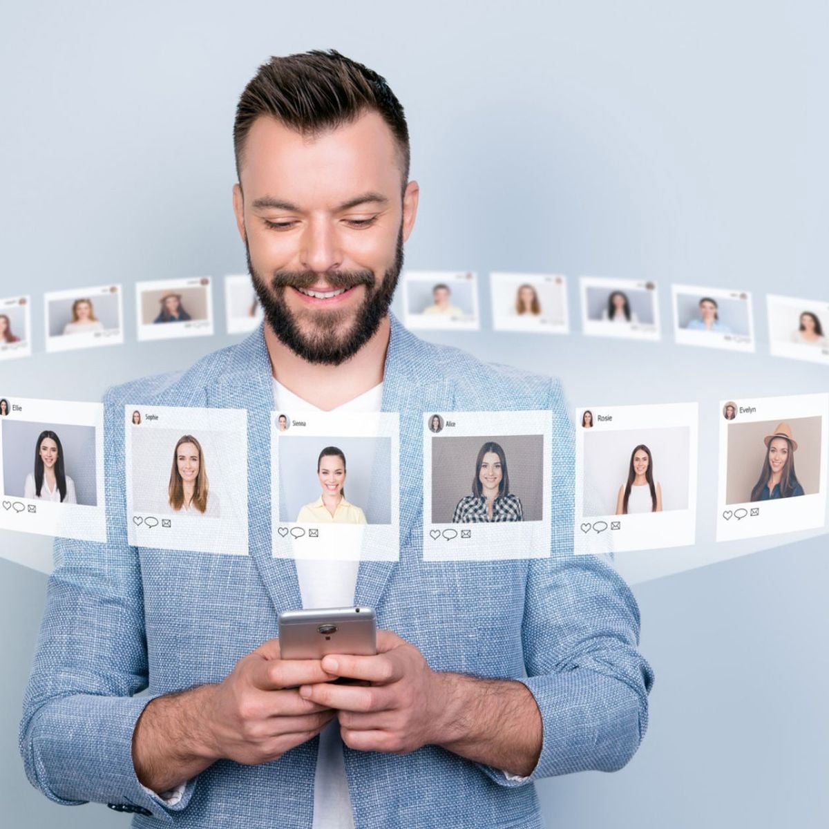 A smiling man in a blue blazer looks at his smartphone. Floating images of various women's profile photos form a semi-circle around him, suggesting online dating or social networking.
