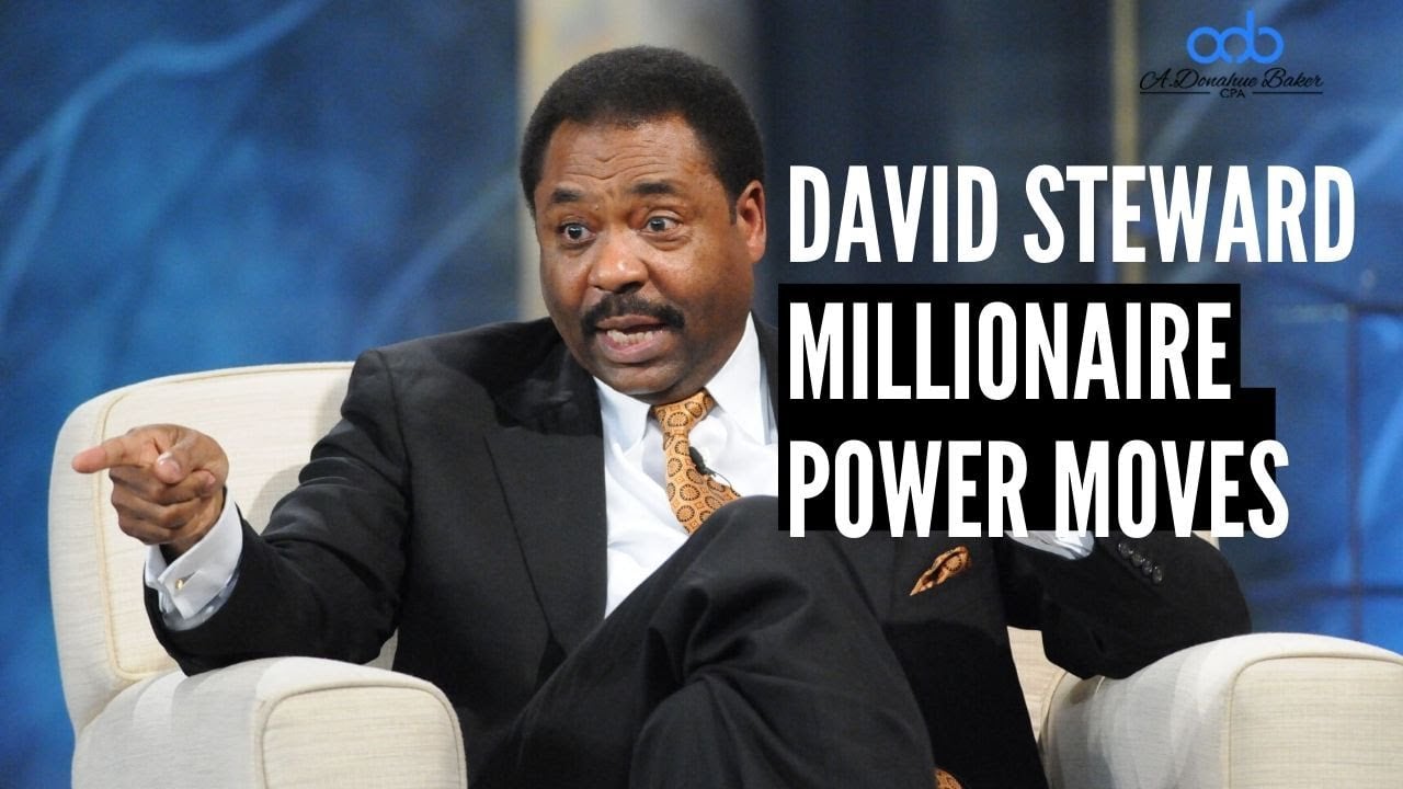 A man in a suit sits on a beige chair, gesturing while speaking. Overlay text reads "David Steward Millionaire Power Moves" with a blue logo in the top right corner.