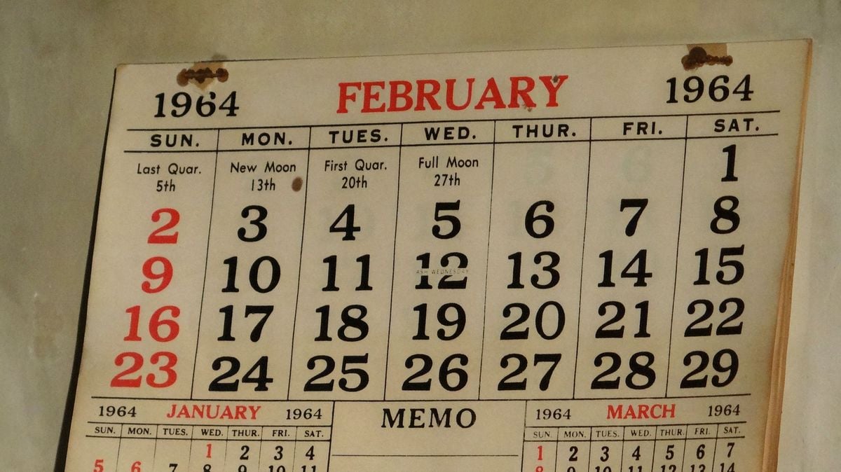 A vintage calendar page for February 1964 shows important lunar dates and Sundays in red, with the month and year displayed at the top. The calendar also has small sections for January and March 1964 at the bottom.