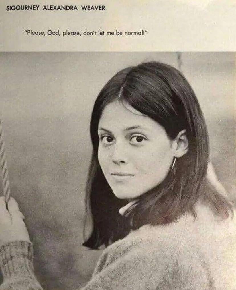 A black-and-white photo of a young woman with straight dark hair, looking at the camera, holding a rope. Text above reads, “Sigourney Alexandra Weaver” and “Please, God, please, don’t let me be normal!”