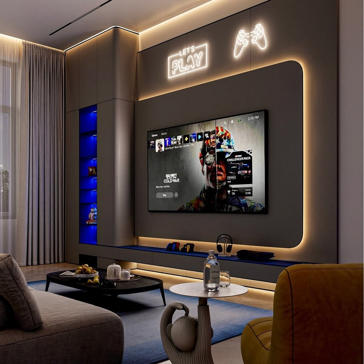 Modern gaming room with a large wall-mounted TV displaying a game menu, LED lighting, built-in shelves with gaming gear, a coffee table, a sofa, and “LET’S PLAY” neon sign with a controller icon above the TV.