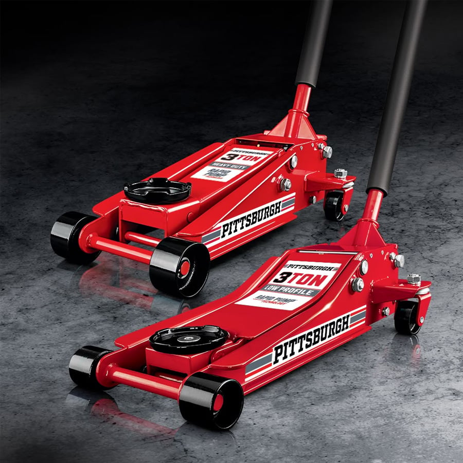 Two red Pittsburgh 3-ton floor jacks with black wheels and handles are positioned on a shiny gray floor, ready for lifting vehicles.