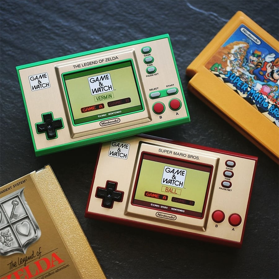 Two Nintendo Game & Watch handheld consoles are displayed, one themed for The Legend of Zelda (green) and one for Super Mario Bros. (red), alongside boxed editions of classic Zelda and Mario games.