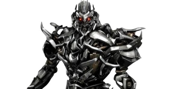 A menacing robot with sharp, metallic armor, glowing red eyes, and an intricate, jagged design stands against a white background.