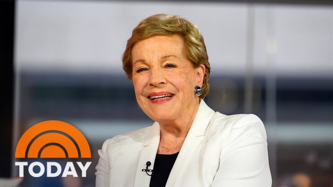 An older woman with short blond hair, wearing a white blazer and black top, smiles while sitting indoors. The TODAY show logo appears in the bottom left corner of the image.
