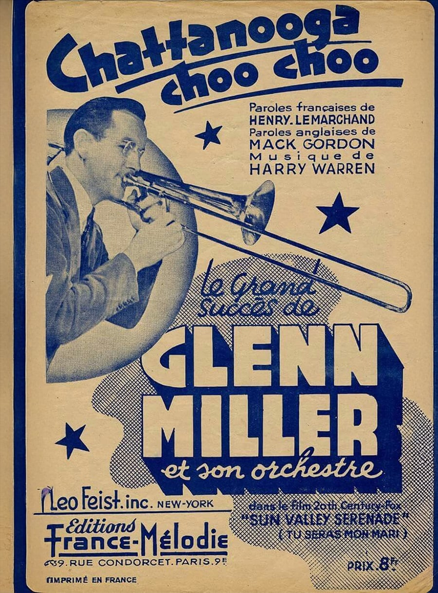 Vintage French poster with blue and white artwork showing Glenn Miller playing a trombone. Text advertises “Chattanooga Choo Choo” and promotes Glenn Miller and his orchestra, with additional song and publisher details.