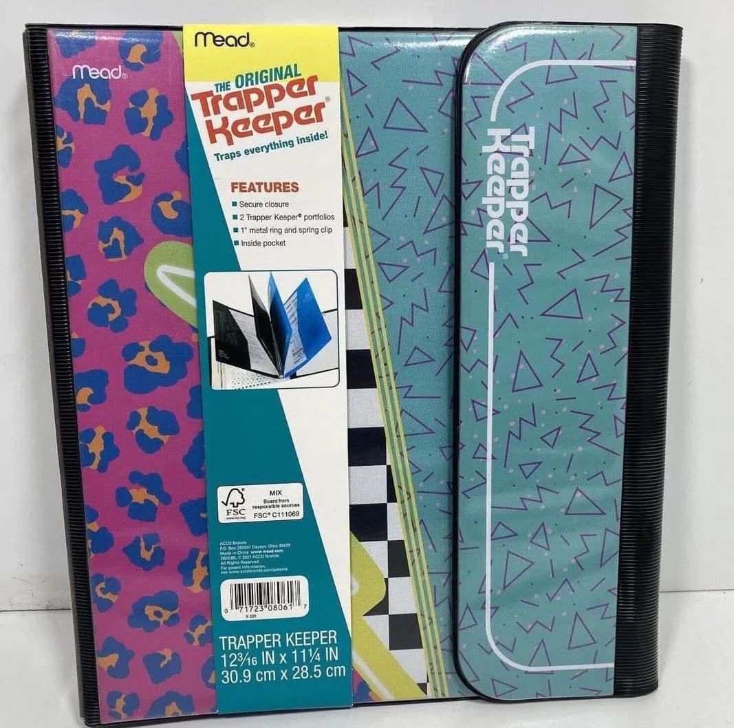 A Mead Trapper Keeper with a colorful, retro geometric design, featuring blue, pink, and teal patterns. The label highlights its features and displays images of the inside folders.