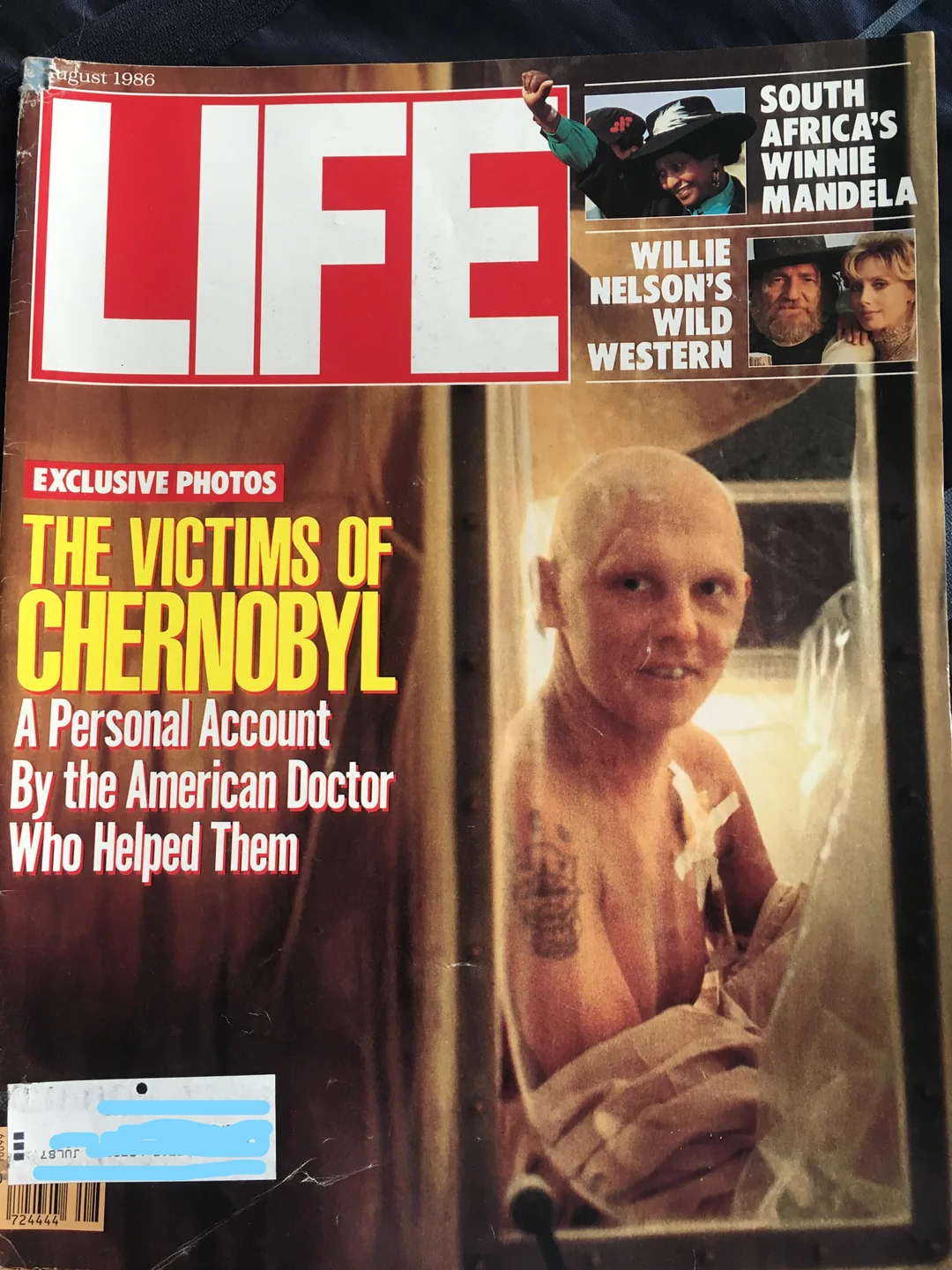 A 1986 LIFE magazine cover shows a bald, bandaged Chernobyl victim in a hospital bed. Headlines mention “The Victims of Chernobyl,” exclusive photos, and South Africa’s Winnie Mandela.