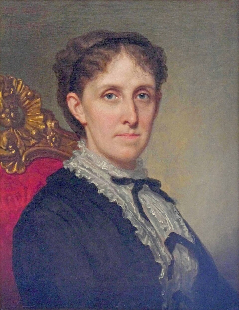 A painted portrait of a woman with curly brown hair, wearing a dark dress with a white ruffled collar, seated on a red and gold ornate chair, looking directly at the viewer with a neutral expression.