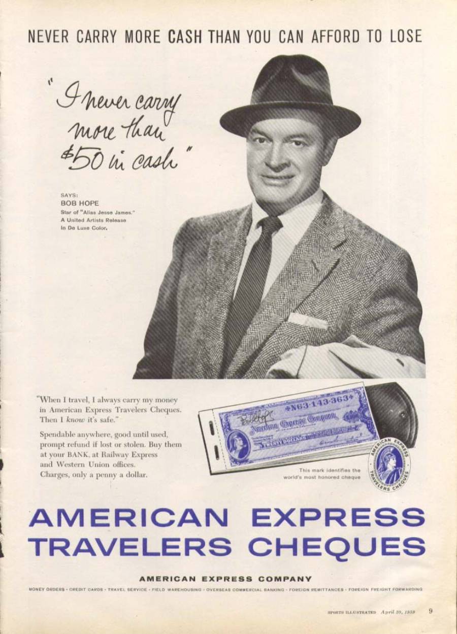 A man in a suit and hat smiles, holding a pen. Handwritten text says, “I never carry more than $50 in cash!” Advertisement promotes American Express Travelers Cheques with an image of a cheque and text details.