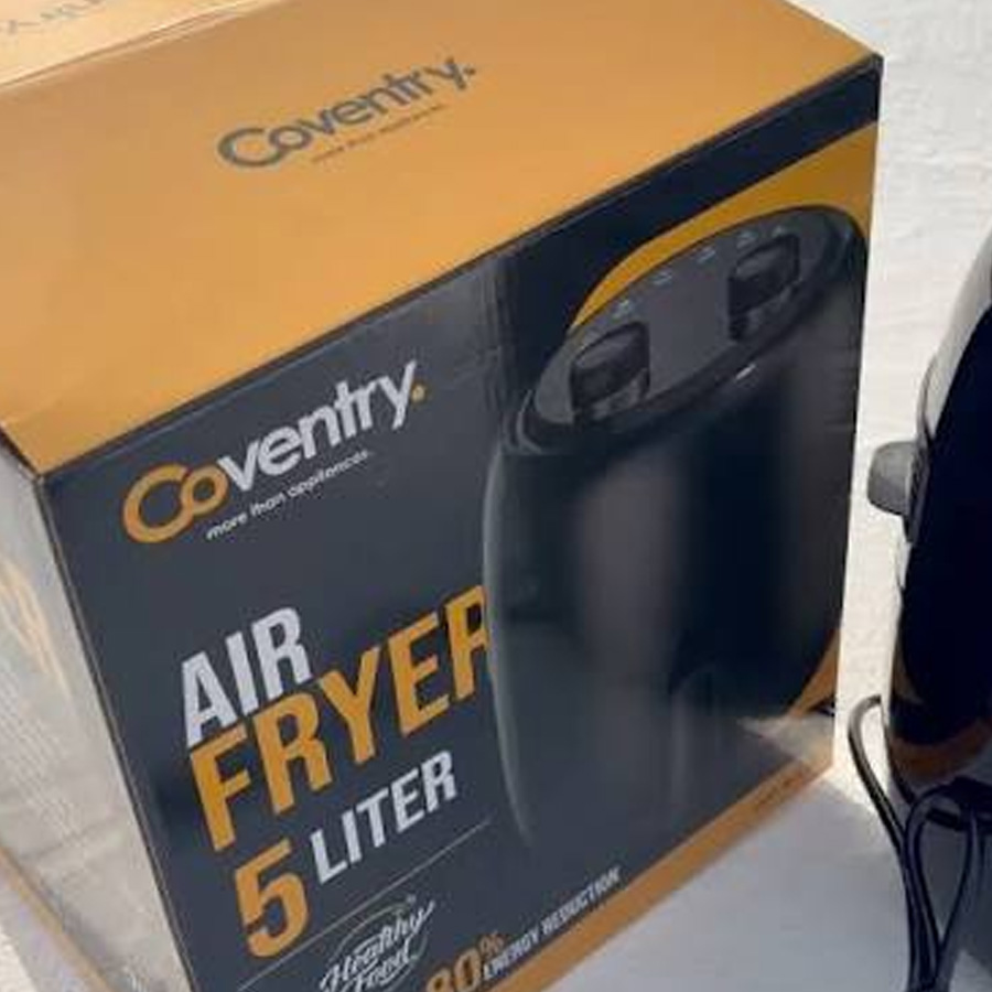 A Coventry brand 5 liter air fryer box is shown next to the air fryer itself. The box is yellow and black with bold text displaying the product details.