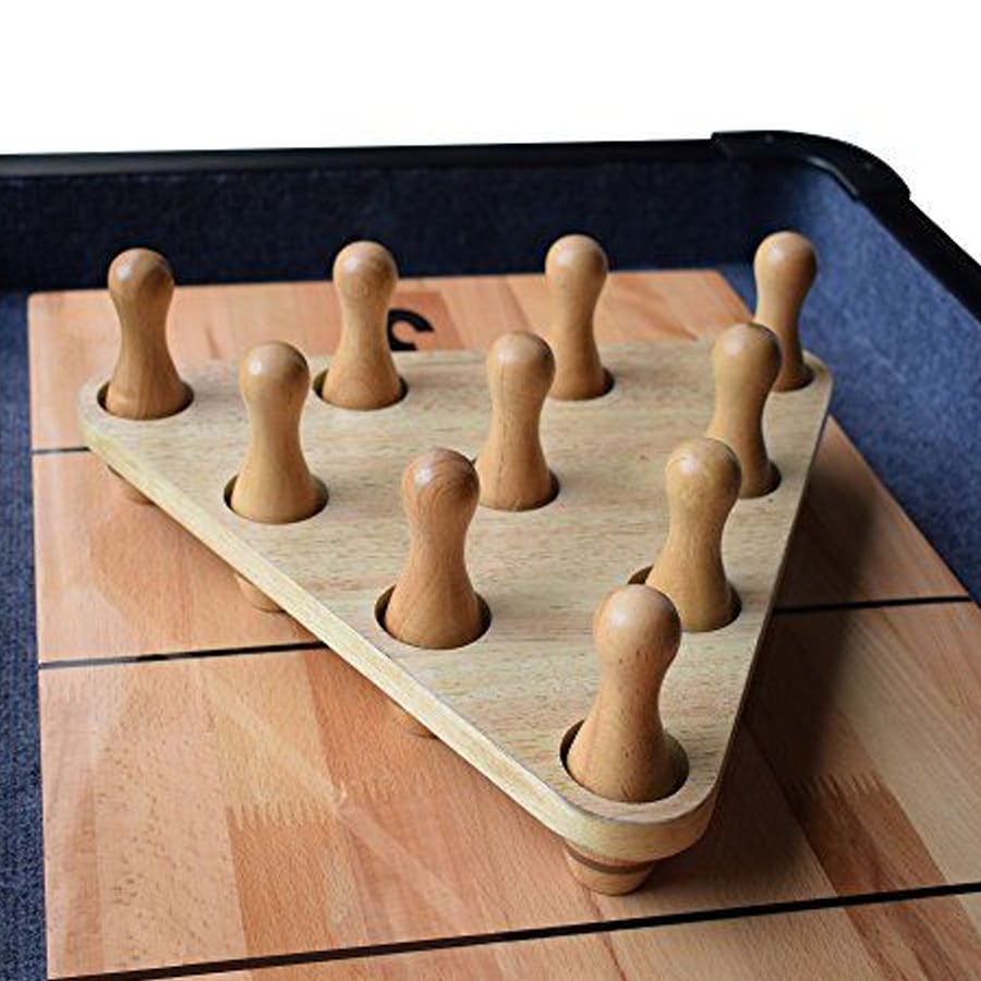 A wooden board game with a triangular base and ten wooden pegs arranged in holes, set on a square wooden surface with grid lines.