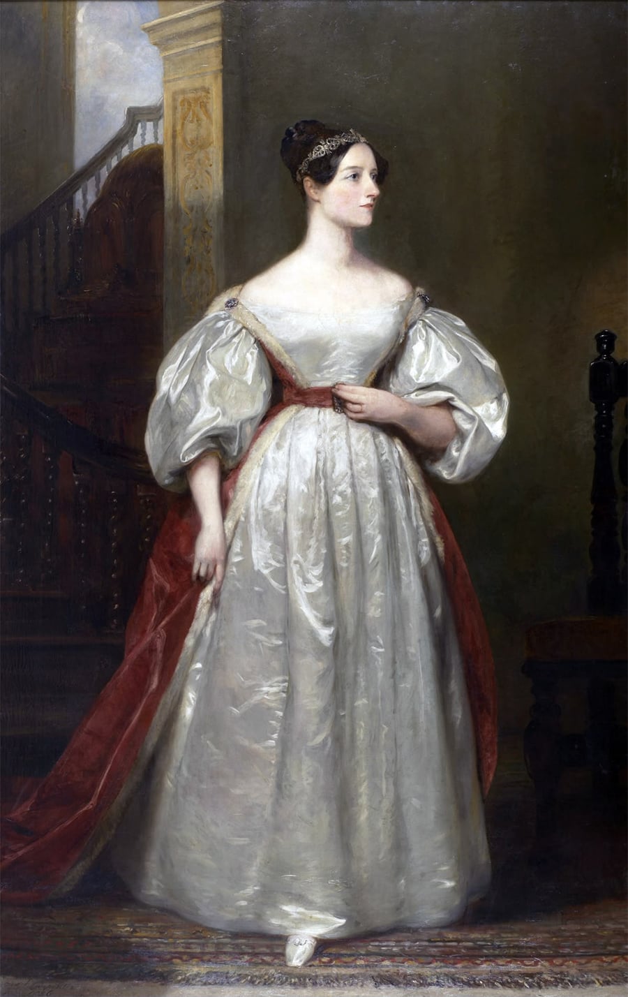 A woman in a white, off-the-shoulder gown with puffed sleeves and a red sash stands indoors near a staircase, gazing to the side. The painting is in a classical, 19th-century style.