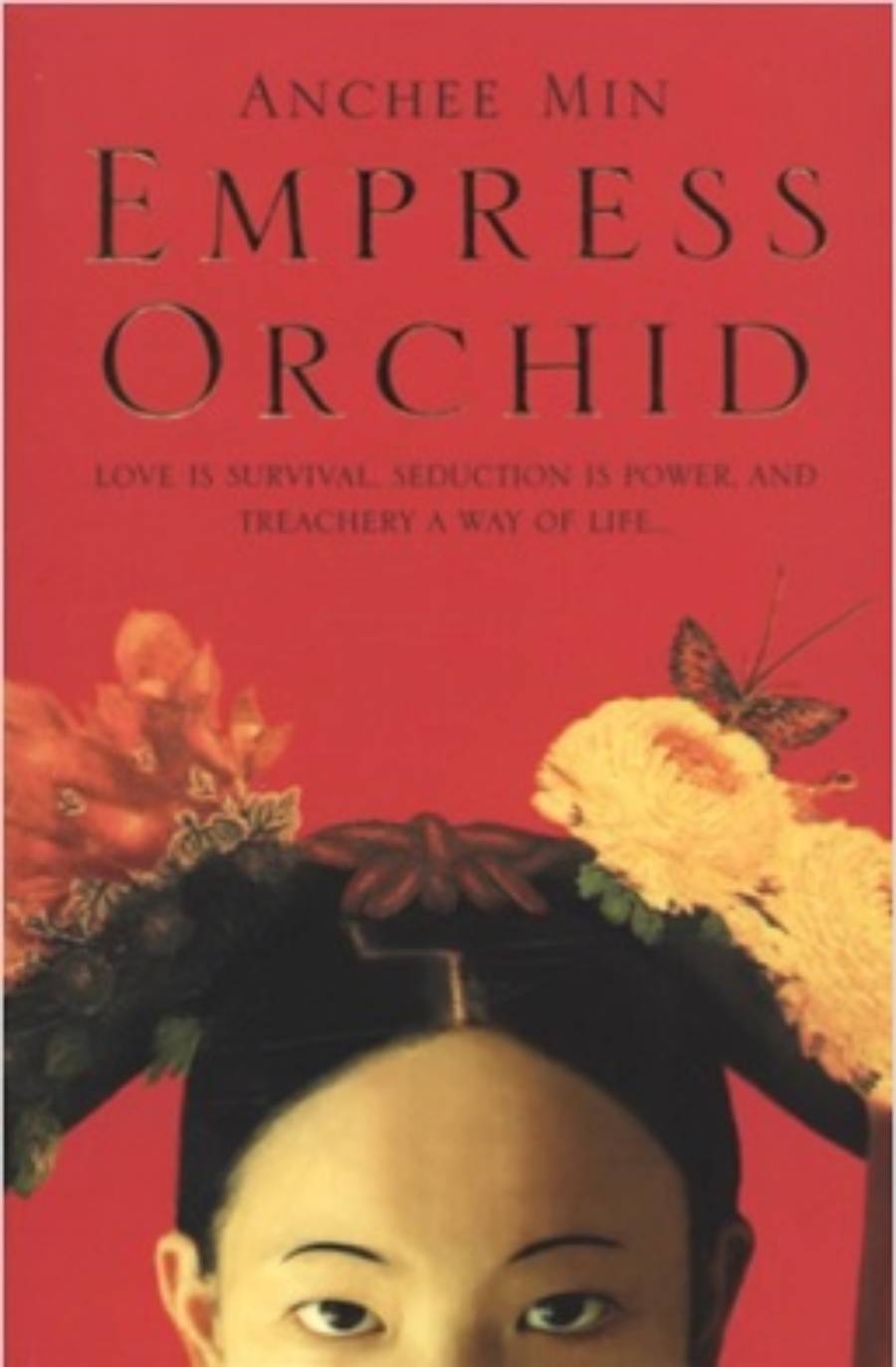 Book cover of “Empress Orchid” by Anchee Min, featuring the top half of a woman’s face with ornate floral and butterfly hair decorations against a red background with the title and author in gold text.