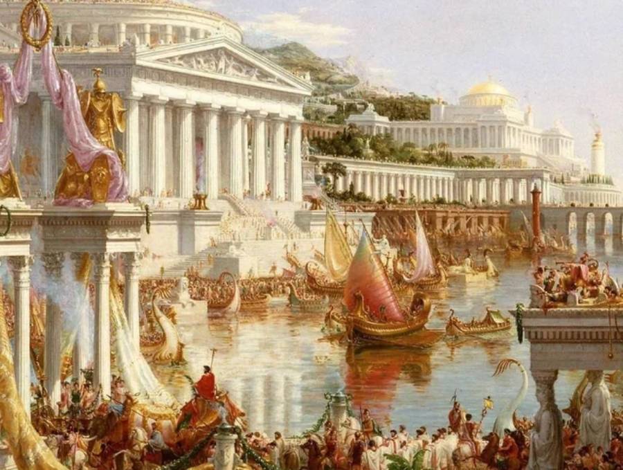 A grand ancient city with marble buildings, columns, and domes; colorful boats fill the waterway, and crowds gather along the shore in festive celebration.