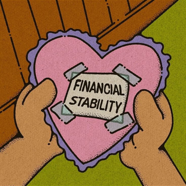 Two hands hold a pink heart-shaped patch with “Financial Stability” taped on it, suggesting financial stability is fragile or a temporary fix.