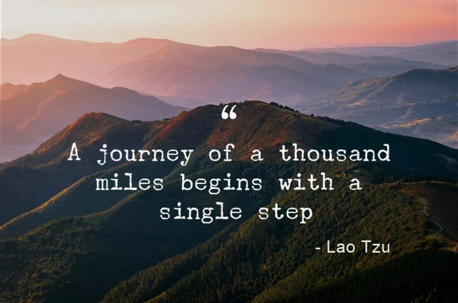 Mountain landscape at sunrise with the quote: “A journey of a thousand miles begins with a single step.” - Lao Tzu