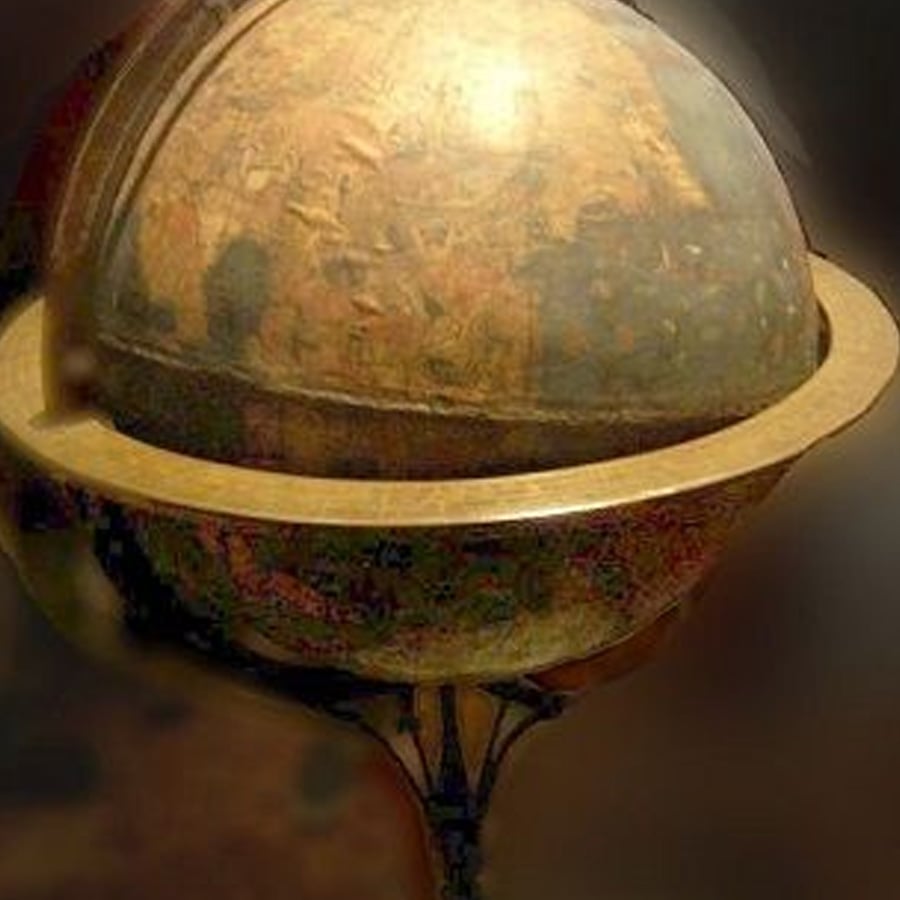 An old, brown, antique globe with faded and worn map markings sits in a wooden frame with a horizontal ring.