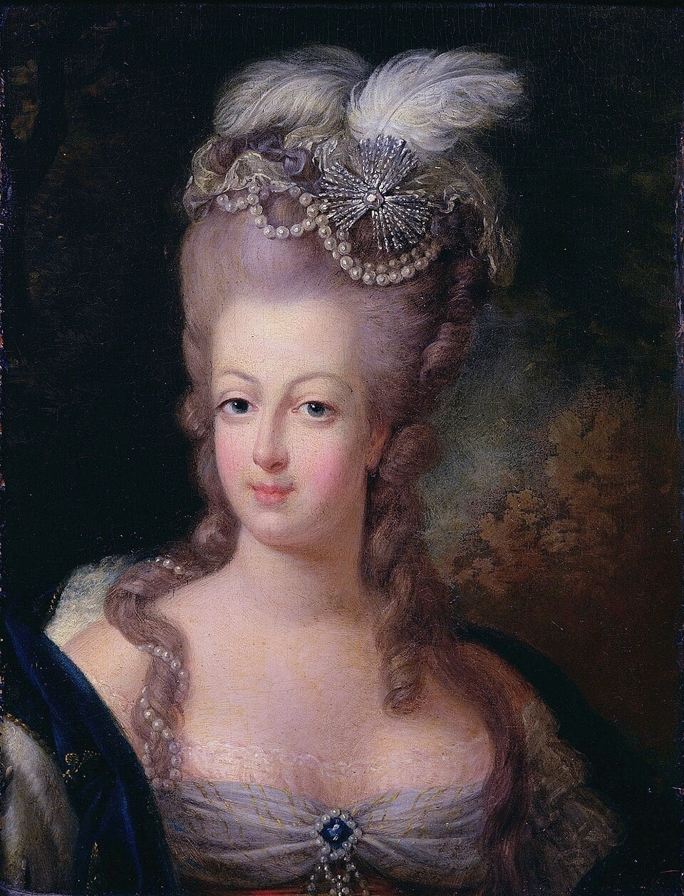 A woman with pale skin and elaborate powdered hair adorned with feathers and pearls, wearing an ornate blue and white gown with lace and a jeweled brooch, poses in a formal painted portrait against a dark, muted background.