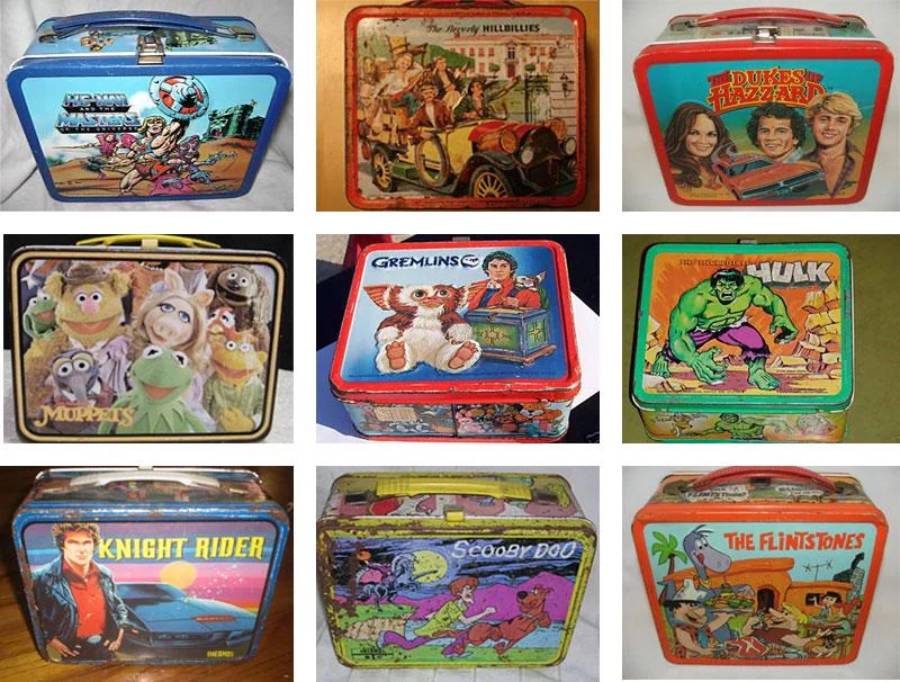 Nine vintage metal lunchboxes featuring artwork from pop culture, including He-Man, Beverly Hillbillies, Dukes of Hazzard, Muppets, Gremlins, Hulk, Knight Rider, Scooby-Doo, and Flintstones.