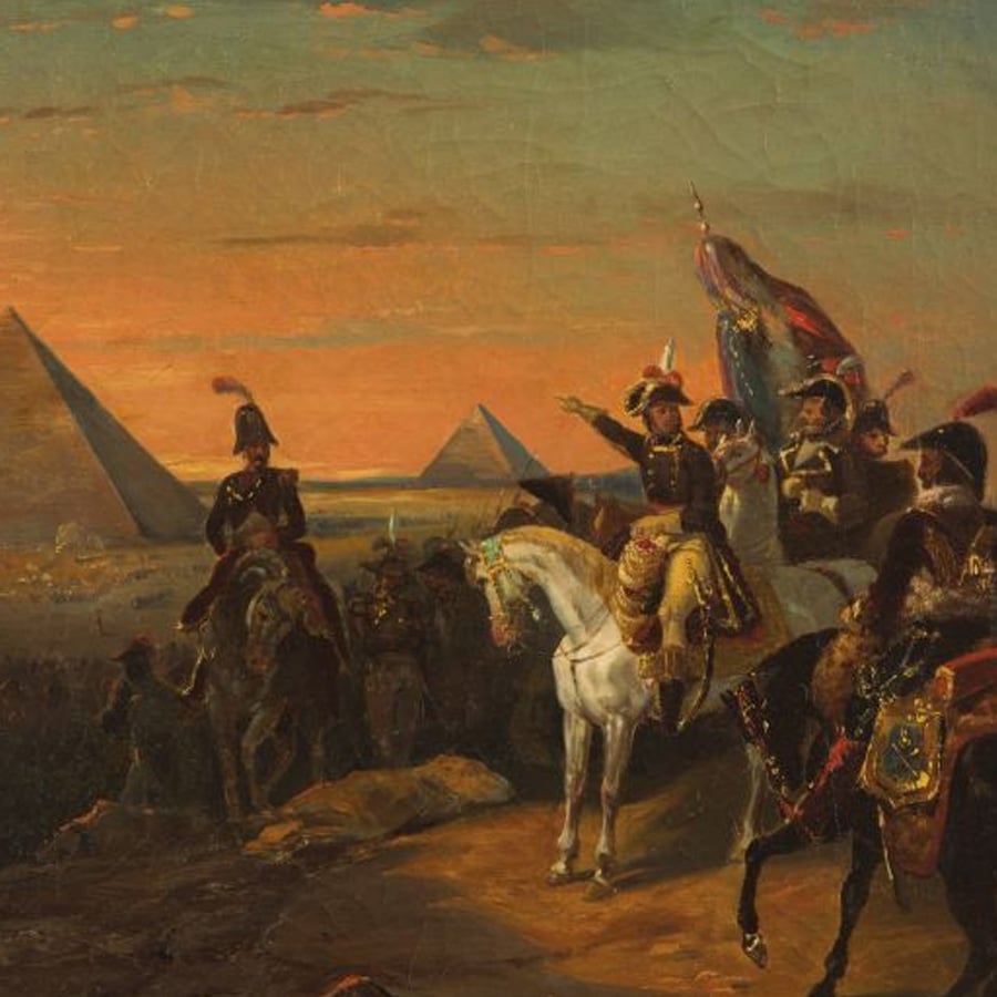 A group of soldiers in 18th-century uniforms, including one on a white horse, gather near the pyramids at sunset, with flags raised and pyramids visible in the background.