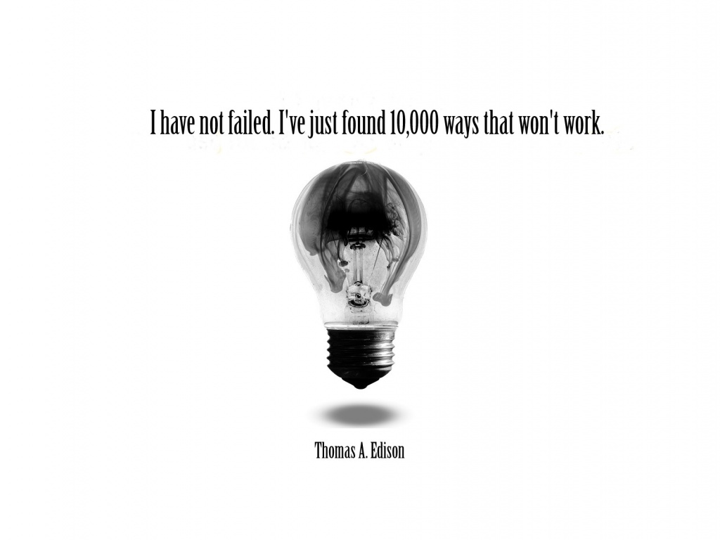 A lightbulb with the quote “I have not failed. I’ve just found 10,000 ways that won’t work.” Attributed to Thomas A. Edison, over a white background.