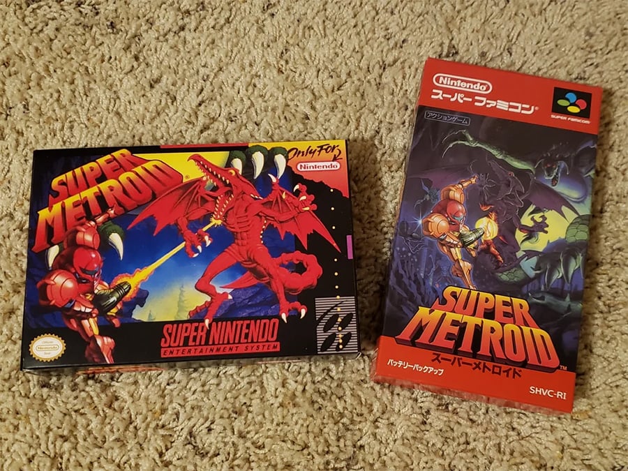 Two Super Metroid game boxes are on a beige carpet: the left is the North American SNES version with a dragon and armored character; the right is the Japanese Super Famicom version with similar artwork and Japanese text.