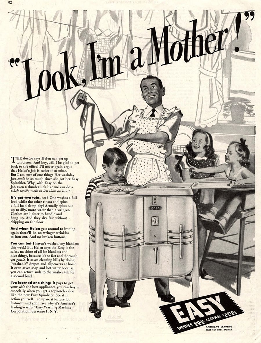 1950s ad shows a smiling woman in an apron with three kids around a washing machine. She raises her hands as laundry hangs behind her. Text reads, “Look, I’m a Mother!” and promotes EASY washing machines.