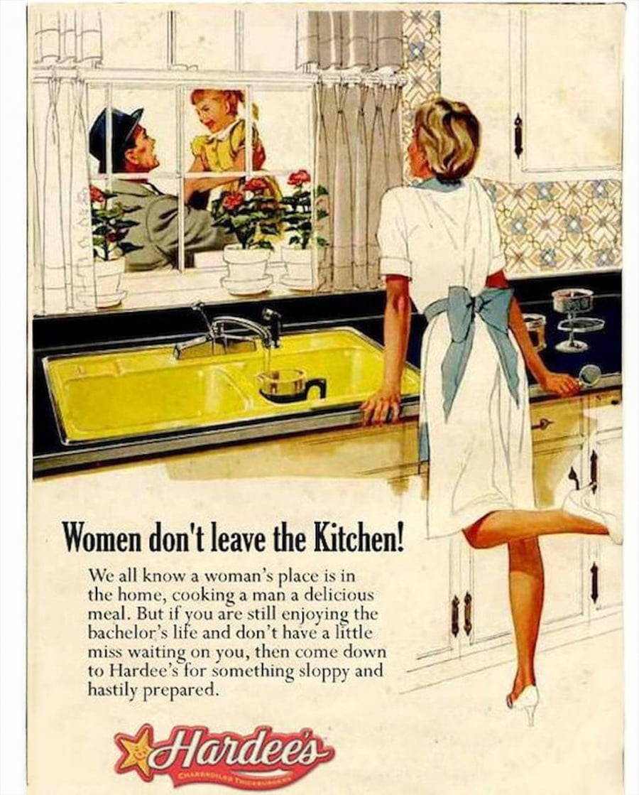 A vintage ad shows a woman in a dress at a kitchen sink, looking out the window at a man and child. The text promotes Hardee’s and suggests women belong in the kitchen.