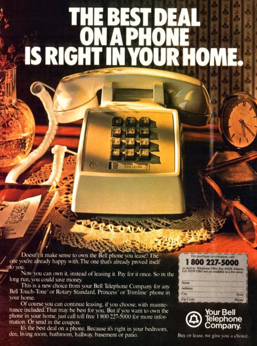 A vintage Bell telephone sits on a lace-covered table with flowers and a candle, under bold text promoting the best phone deal available at home. A Bell logo and customer service number appear in the bottom right corner.