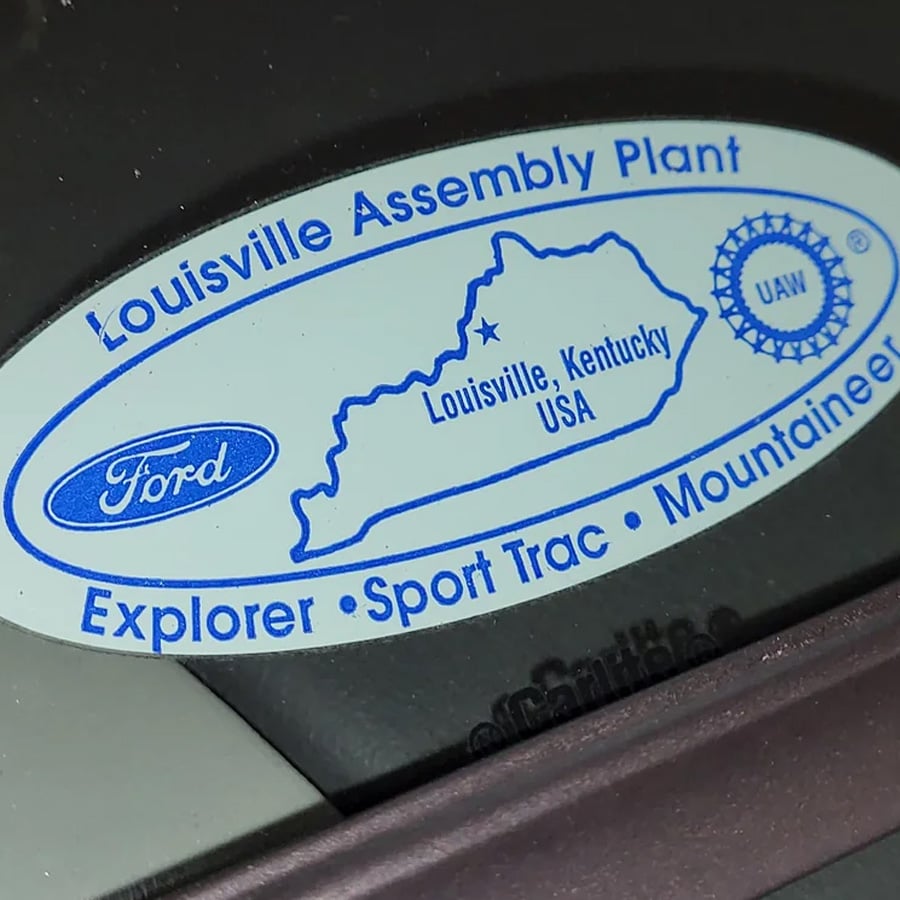Oval sticker showing the outline of Kentucky, the text “Louisville Assembly Plant,” “Louisville, Kentucky USA,” “Ford,” “Explorer,” “Sport Trac,” “Mountaineer,” and the UAW logo.