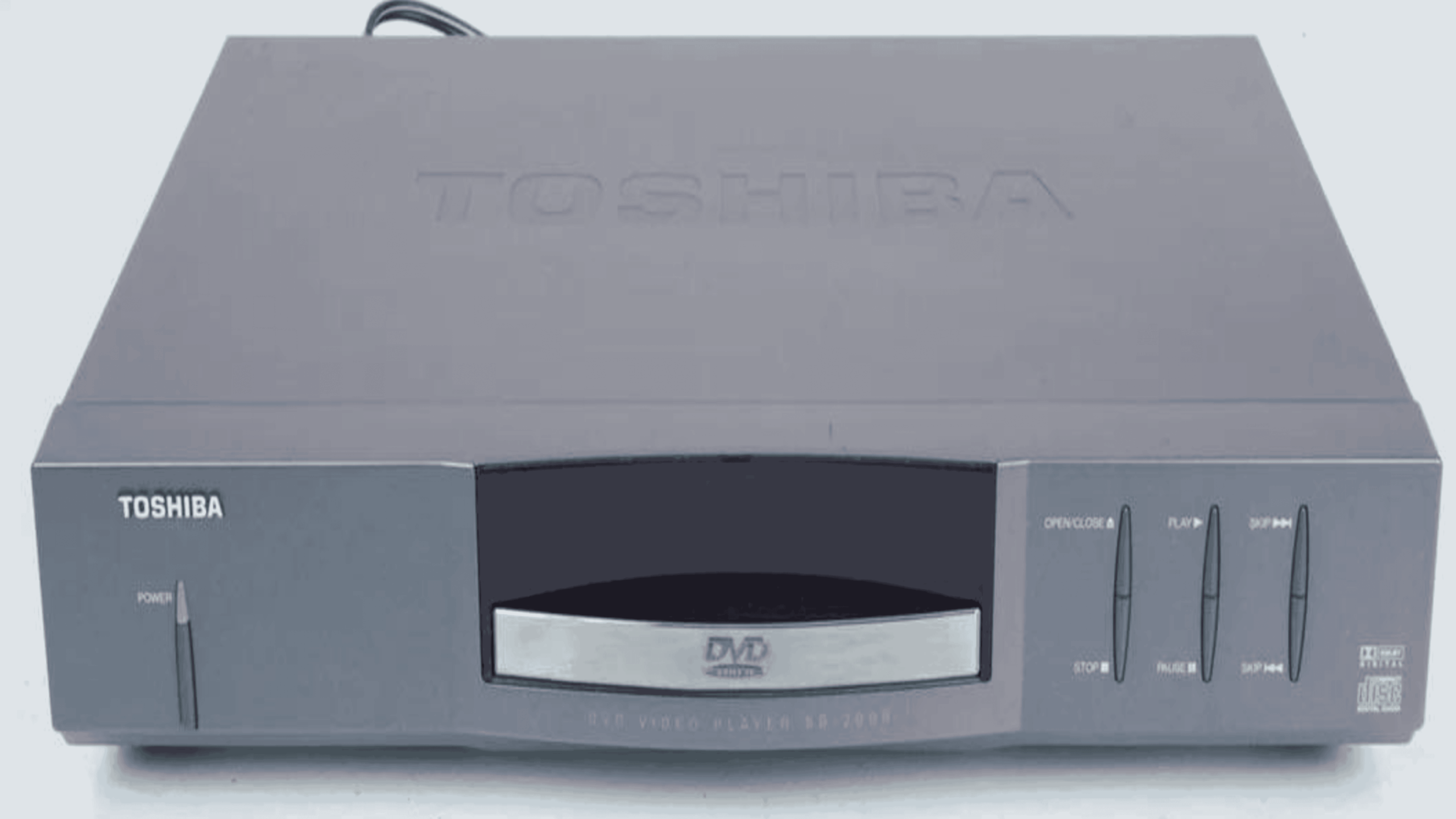 A gray Toshiba DVD video player with a front-loading disc tray, control buttons, and a power button on the left side.